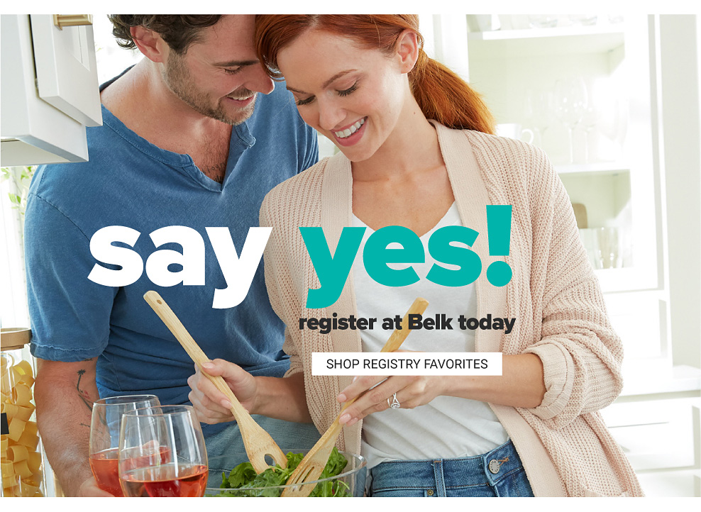 A man wearing a blue polo standing next to a woman wearing a beige sweater over a white top & blue jeans. Say yes! Register at Belk today. Shop registry favorites.