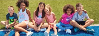 Image of 6 kids on football field