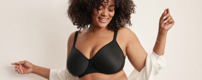 An image of a woman in a black bra.