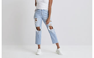 Image of cropped jeans Cropped Jeans With a shorter inseam that hits right above the ankle, cropped jeans are great for warmer days and showing off your shoes. 