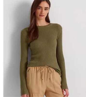 Image of woman wearing green ribbed pullover sweater