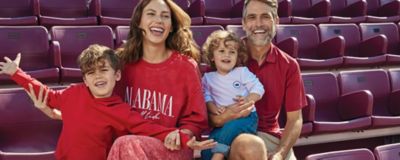 Image of family sitting in bleachers.