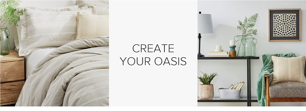 A bed with a beige comforter and pillows to match. A chair with a beige throw pillow and a green throw blanket. Geometric abstract wall decor. A table with a lamp, candles and artificial plants. Create your oasis.