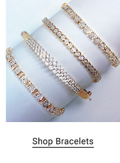 Four gold, diamond bracelets. Shop bracelets.