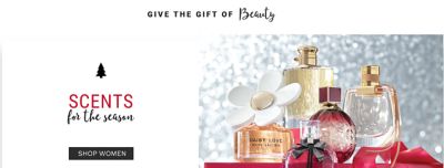 An assortment of women's fragrance bottles. Scents for the season. Shop women