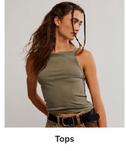 Image of a woman wearing a tank top. Tops. 