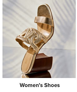 Image of a strappy heel shoe. Shop women's shoes.