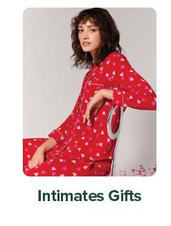 Image of a woman wearing red pajamas. Intimate Gifts.