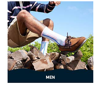 An image of a man wearing tall white socks and brown Sperry boat shoes. Shop men.