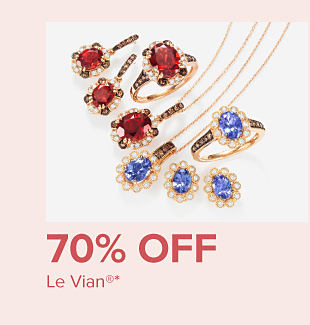 Assortment of necklaces, rings and earrings with red and blue gems. 70% off Le Vian.