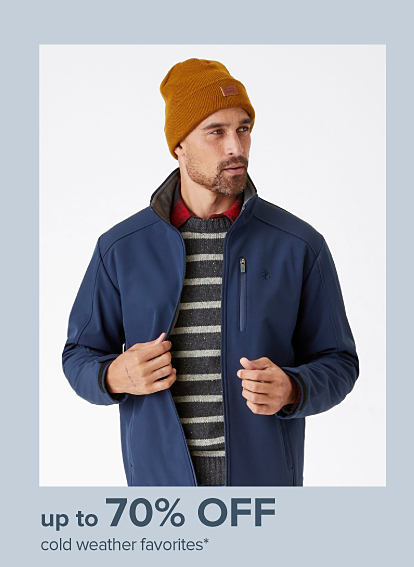 Image of a man wearing cold weather clothes. Up to 70% off cold weather favorites. 