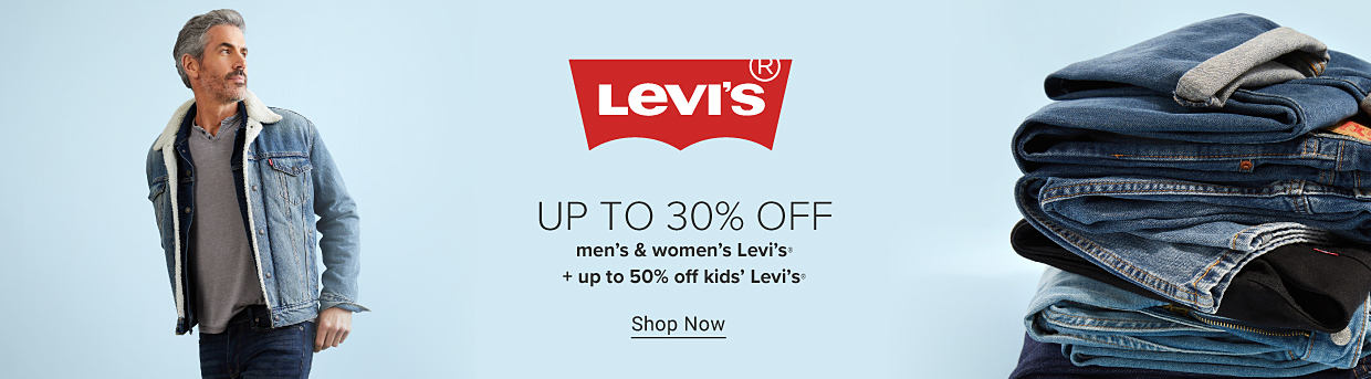 A man in blue jeans and a denim jacket. Levi's logo. Up to 30% off men's and women's Levi's. Up to 50% off kids' Levi's. Shop Now. A stack of folded jeans. 