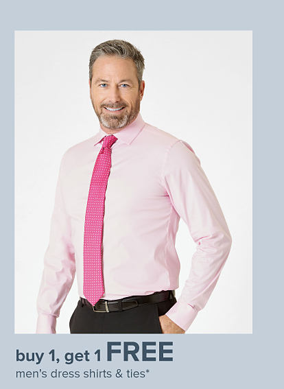Image of a man wearing a button down with a pink tie. Buy 1, get 1 free men's dress shirts and ties.