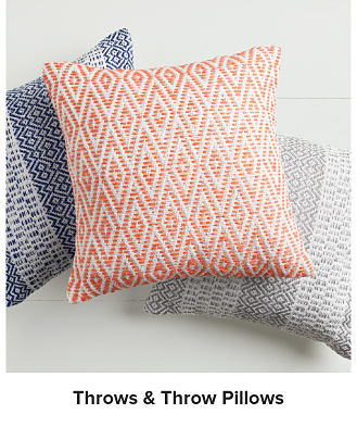 Blue, red and gray throw pillows. Shop throws and throw pillows.