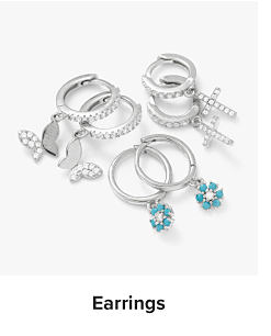 An image of silver earrings. Shop earrings.