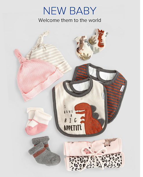 Assortment of baby clothes and bibs. New baby. Welcome them to the world. 