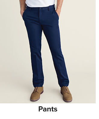 A man in blue pants. Shop pants.