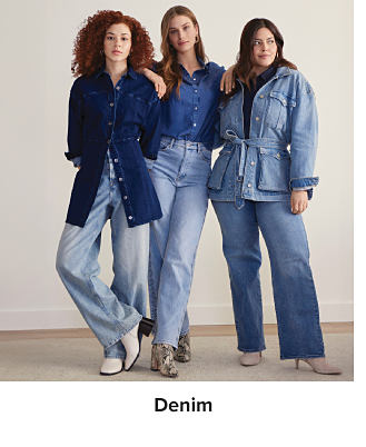 Three women in denim pants, shirts and jackets. Shop denim.