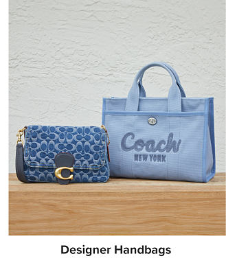 A blue Coach tote and small handbag. Shop designer handbags.