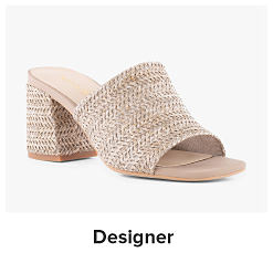 An image of a designer block heel sandal. Shop designer.