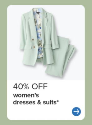A pale green suit. 40% off women's dresses and suits.
