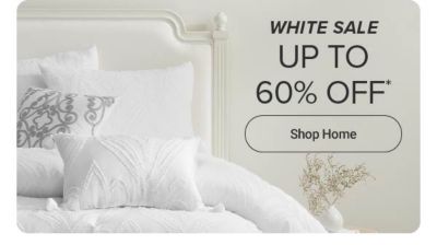 An image of a white couch with white throw pillows. White Sale. Up to 60% off. Shop home.