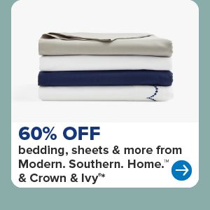 A stack of folded sheets. 60% off bedding, sheets and more from Modern Southern Home and Crown and Ivy.