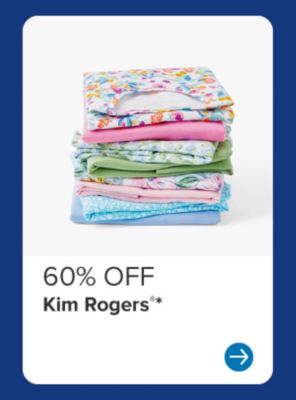 Stack of colorful shirts. 60% off Kim Rogers.