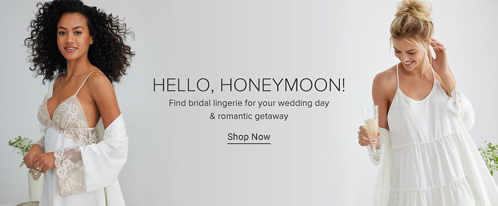 A woman wearing a white nightgown with lace and a robe to match. An image of a woman wearing a white nightgown with a white robe. Hello, honeymoon! Find bridal lingerie for your wedding day and romantic getaway