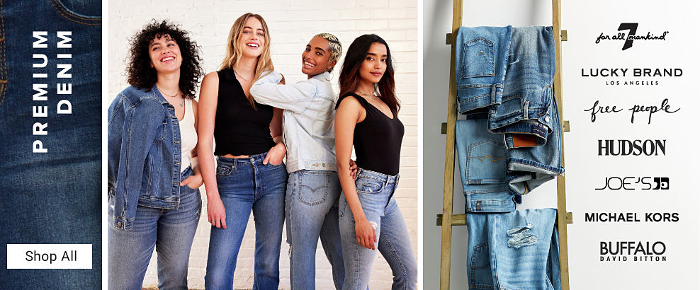 Premium denim. A group of women in denim. Jeans hanging on a ladder. Logos for seven for all mankind, Lucky Brand, Free People, Hudson, Joe's, Michael Kors, and Buffalo David Bitton. 