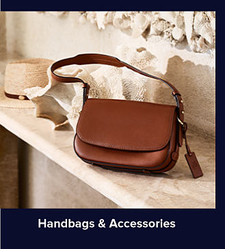 An image of a brown handbag. Shop handbags and accessories.