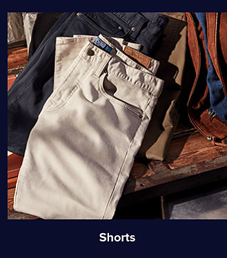 An image of khaki shorts. Shop shorts. 