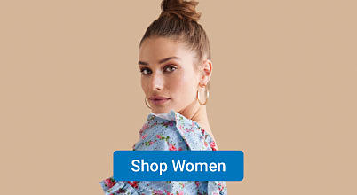 A woman in a light blue and red top. Shop women.
