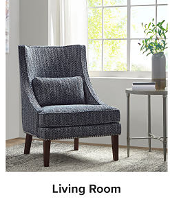 An image of a chair and a side table. Shop living room.