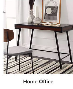 An image of a desk and a chair. Shop home office.