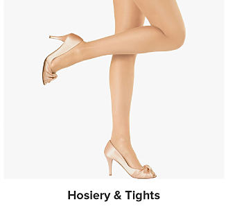 A woman in high heels and pantyhose. Shop hosiery.