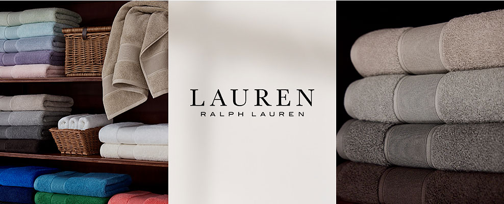 Shelves filled with folded towels in different colors. Lauren Ralph Lauren.