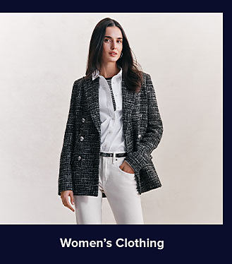 A woman in a gray blazer, white button up and white pants. Shop women's clothing.