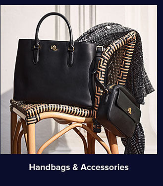 Black handbags on a chair. Shop handbags and accessories.