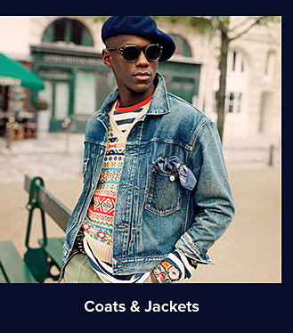 A man in a blue denim jacket. Shop coats and jackets.