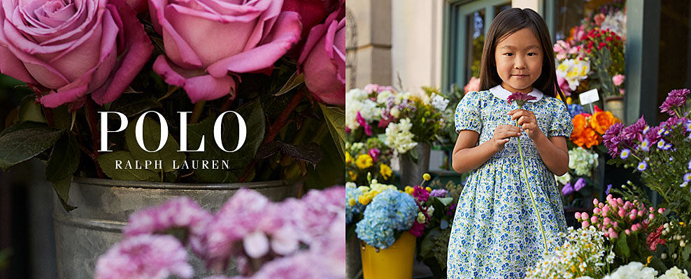 A girl in a blue and green floral dress. Polo Ralph Lauren.