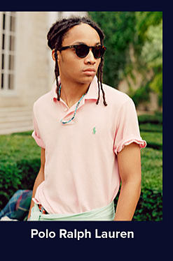 A man in a pink polo shirt. Shop Polo Ralph Lauren