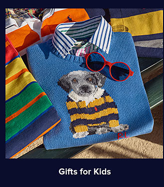 A blue kids' sweater with a dog in a Polo shirt. Shop gifts for kids.