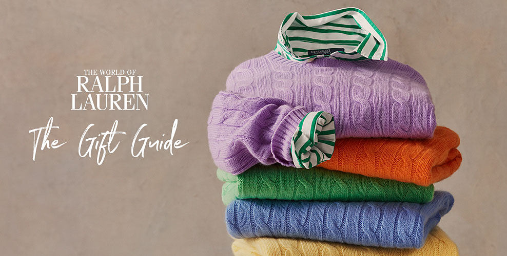 A stack of colorful corded sweaters. The World of Ralph Lauren. The Gift Guide.