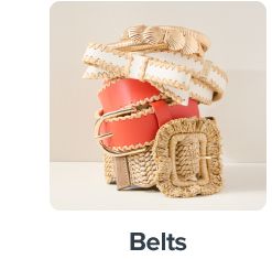 Three belts, wound up and stack atop one another. Shop belts.