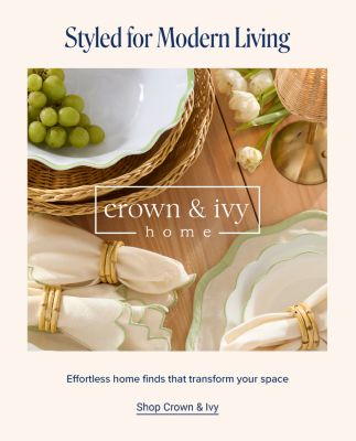 Crown and Ivy home. Styled for modern living. A table set with ceramic plates, glassware and napkins. Effortless home finds that transform your space. Shop Crown and Ivy.