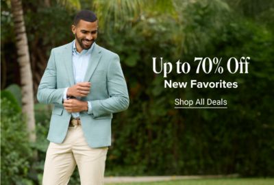 Up 70% off new favorites. Shop all deals. A man in a green suit and khaki pants.