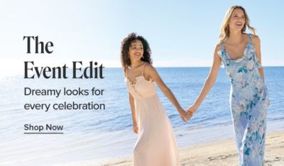 The event edit. Dreamy looks for every celebration. Shop now. A woman in a pink dress holding hands with a woman in a blue floral print dress on the beach.
