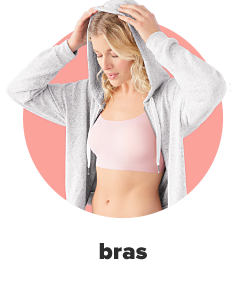 A woman in a white wirefree bra. Shop bras.