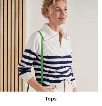 Image of a woman wearing a black and white striped collared shirt. Shop tops.